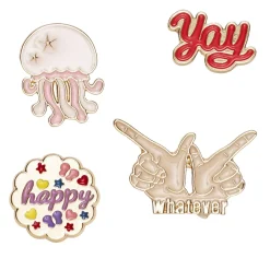 Pins, badges, 4 stk. gyldne og farverige små mini-brocher med attitude – og en vandmand!