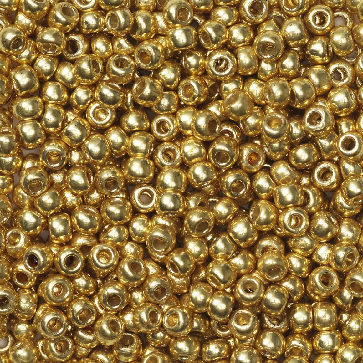 TOHO-perler runde 11/0 – guld, PF557 Permament finish galvanized gold