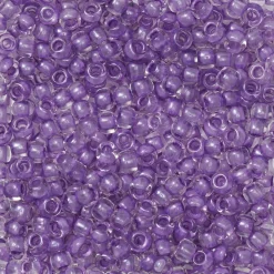 TOHO-perler runde 11/0 – lyslilla, 935 Purple lined crystal